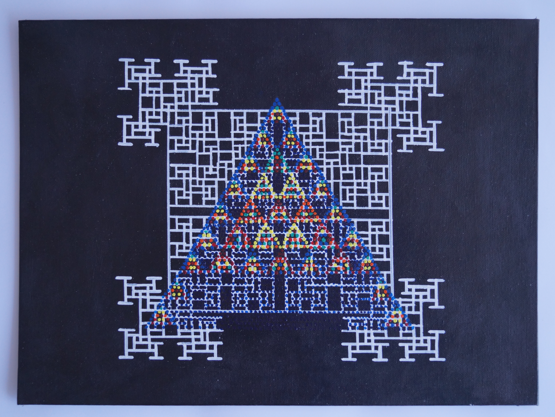A black canvas with a white toothpick sequence as well as a colored version of the Sierpinski triangle.